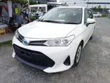 2021 Toyota Corolla Axio HYBRID EX ECVT White Sedan for sale, Japanese used car export - photo 1 of 9 | GULJI TRADERS