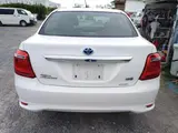2021 Toyota Corolla Axio HYBRID EX ECVT White Sedan for sale, Japanese used car export - photo 2 of 9 | GULJI TRADERS