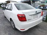 2021 Toyota Corolla Axio HYBRID EX ECVT White Sedan for sale, Japanese used car export - photo 6 of 9 | GULJI TRADERS