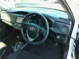 2023 Toyota Corolla Axio Hybrid EX White Sedan for sale, Japanese used car export - photo 5 of 13 | GULJI TRADERS