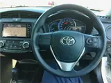 2023 Toyota Corolla Axio Hybrid EX White Sedan for sale, Japanese used car export - photo 10 of 13 | GULJI TRADERS