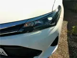 2023 Toyota Corolla Axio Hybrid EX White Sedan for sale, Japanese used car export - photo 13 of 13 | GULJI TRADERS