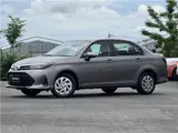 2025 Toyota Corolla Axio EX, Cold Weather Package, Rear Wiper, Spare Tire, AIS Inspection Brown Sedan for sale, Japanese used car export - photo 1 of 31 | GULJI TRADERS