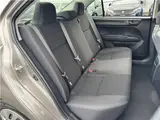 2025 Toyota Corolla Axio EX, Cold Weather Package, Rear Wiper, Spare Tire, AIS Inspection Brown Sedan for sale, Japanese used car export - photo 13 of 31 | GULJI TRADERS