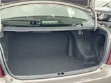 2025 Toyota Corolla Axio EX, Cold Weather Package, Rear Wiper, Spare Tire, AIS Inspection Brown Sedan for sale, Japanese used car export - photo 16 of 31 | GULJI TRADERS