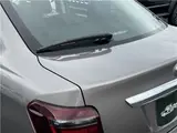 2025 Toyota Corolla Axio EX, Cold Weather Package, Rear Wiper, Spare Tire, AIS Inspection Brown Sedan for sale, Japanese used car export - photo 25 of 31 | GULJI TRADERS