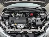 2025 Toyota Corolla Axio EX, Cold Weather Package, Rear Wiper, Spare Tire, AIS Inspection Brown Sedan for sale, Japanese used car export - photo 30 of 31 | GULJI TRADERS
