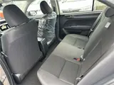 2025 Toyota Corolla Axio EX, rear wiper, spare tire, LED headlights, AIS inspection Brown Sedan for sale, Japanese used car export - photo 16 of 32 | GULJI TRADERS