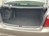 2025 Toyota Corolla Axio EX, rear wiper, spare tire, LED headlights, AIS inspection Brown Sedan for sale, Japanese used car export - photo 18 of 32 | GULJI TRADERS