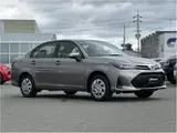2025 Toyota Corolla Axio EX, rear wiper, spare tire, LED headlights, AIS inspection Brown Sedan for sale, Japanese used car export - photo 22 of 32 | GULJI TRADERS
