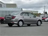 2025 Toyota Corolla Axio EX, rear wiper, spare tire, LED headlights, AIS inspection Brown Sedan for sale, Japanese used car export - photo 25 of 32 | GULJI TRADERS