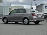 2025 Toyota Corolla Axio EX, rear wiper, spare tire, LED headlights, AIS inspection Brown Sedan for sale, Japanese used car export - photo 27 of 32 | GULJI TRADERS