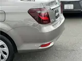 2025 Toyota Corolla Axio EX, rear wiper, spare tire, LED headlights, AIS inspection Brown Sedan for sale, Japanese used car export - photo 28 of 32 | GULJI TRADERS