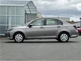 2025 Toyota Corolla Axio EX, rear wiper, spare tire, LED headlights, AIS inspection Brown Sedan for sale, Japanese used car export - photo 29 of 32 | GULJI TRADERS