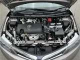 2025 Toyota Corolla Axio EX, rear wiper, spare tire, LED headlights, AIS inspection Brown Sedan for sale, Japanese used car export - photo 31 of 32 | GULJI TRADERS