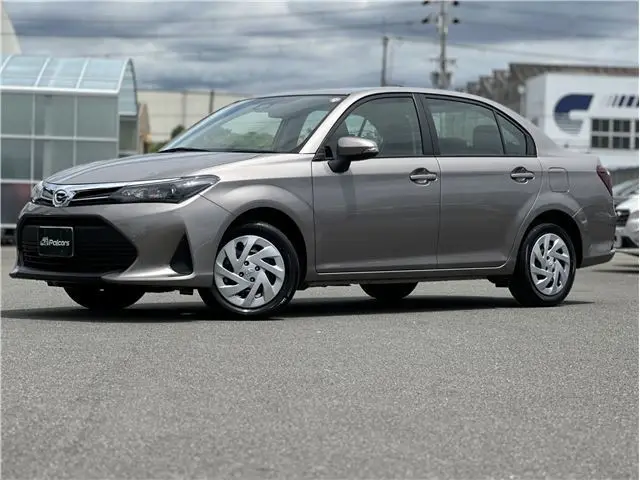 2025 Toyota Corolla Axio EX, rear wiper, spare tire, LED headlights, AIS inspection Brown Sedan for sale, Japanese used car export | GULJI TRADERS