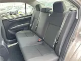 2025 Toyota Corolla Axio EX, rear wiper, spare tire, LED headlights, AIS inspection Brown Sedan for sale, Japanese used car export - photo 14 of 29 | GULJI TRADERS