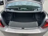 2025 Toyota Corolla Axio EX, rear wiper, spare tire, LED headlights, AIS inspection Brown Sedan for sale, Japanese used car export - photo 18 of 29 | GULJI TRADERS