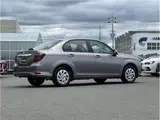 2025 Toyota Corolla Axio EX, rear wiper, spare tire, LED headlights, AIS inspection Brown Sedan for sale, Japanese used car export - photo 23 of 29 | GULJI TRADERS