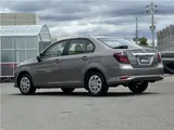 2025 Toyota Corolla Axio EX, rear wiper, spare tire, LED headlights, AIS inspection Brown Sedan for sale, Japanese used car export - photo 25 of 29 | GULJI TRADERS