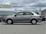 2025 Toyota Corolla Axio EX, rear wiper, spare tire, LED headlights, AIS inspection Brown Sedan for sale, Japanese used car export - photo 26 of 29 | GULJI TRADERS