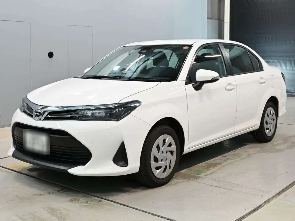 2025 Toyota Corolla Axio EX - photo 1 2025 Toyota Corolla Axio EX White Sedan for sale, Japanese used car export - photo 1 of 12 | GULJI TRADERS