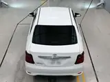 2025 Toyota Corolla Axio EX White Sedan for sale, Japanese used car export - photo 8 of 12 | GULJI TRADERS
