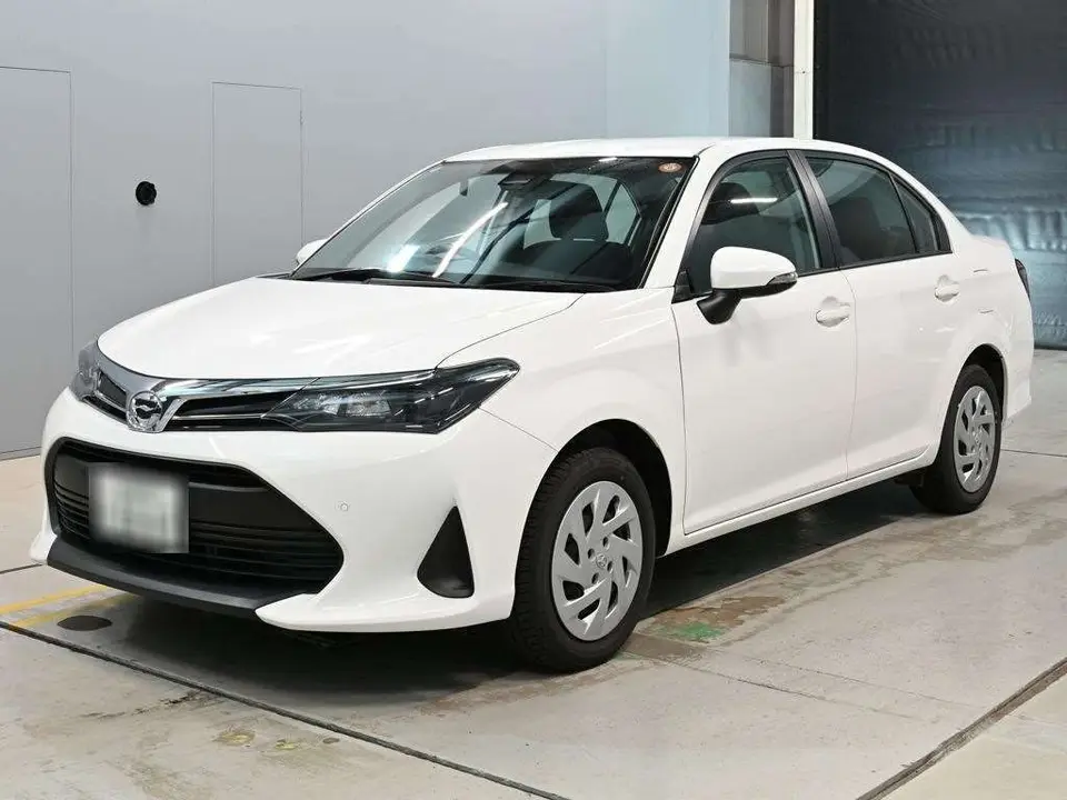 2025 Toyota Corolla Axio EX - photo 1 2025 Toyota Corolla Axio EX White Sedan for sale, Japanese used car export - photo 1 of 12 | GULJI TRADERS