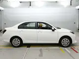 2025 Toyota Corolla Axio EX White Sedan for sale, Japanese used car export - photo 3 of 12 | GULJI TRADERS