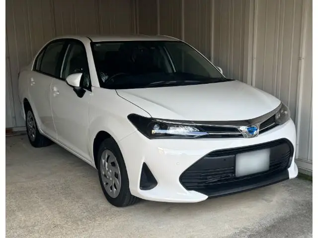 2026 Toyota Corolla Axio Hybrid EX White Sedan for sale, Japanese used car export | GULJI TRADERS
