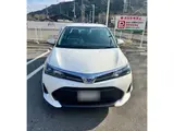 2026 Toyota Corolla Axio Hybrid EX White Sedan for sale, Japanese used car export - photo 2 of 13 | GULJI TRADERS