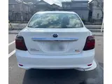 2026 Toyota Corolla Axio Hybrid EX White Sedan for sale, Japanese used car export - photo 3 of 13 | GULJI TRADERS