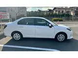 2026 Toyota Corolla Axio Hybrid EX White Sedan for sale, Japanese used car export - photo 4 of 13 | GULJI TRADERS