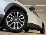2025 Toyota Corolla Cross HYBRID Z Pearl SUV for sale, Japanese used car export - photo 19 of 20 | GULJI TRADERS
