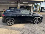 2025 Toyota Corolla Cross 1.8 HYBRID Z Black SUV for sale, Japanese used car export - photo 18 of 30 | GULJI TRADERS