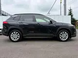 2025 Toyota Corolla Cross 1.8 Hybrid S E-Four 4WD Black SUV for sale, Japanese used car export - photo 3 of 20 | GULJI TRADERS