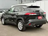 2025 Toyota Corolla Cross 1.8 Hybrid S E-Four 4WD Black SUV for sale, Japanese used car export - photo 6 of 20 | GULJI TRADERS