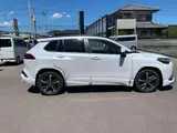 2025 Toyota Corolla Cross 1.8 Hybrid Z Modellis Pearl SUV for sale, Japanese used car export - photo 5 of 9 | GULJI TRADERS