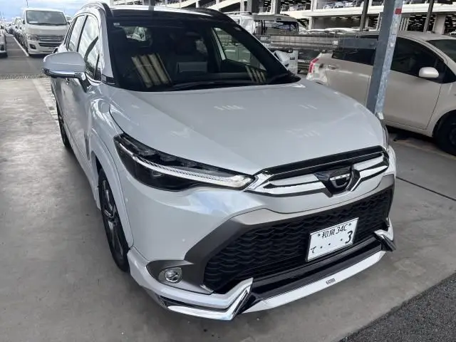 2025 Toyota Corolla Cross Hybrid Z Pearl SUV for sale, Japanese used car export - photo 1 of 3 | GULJI TRADERS