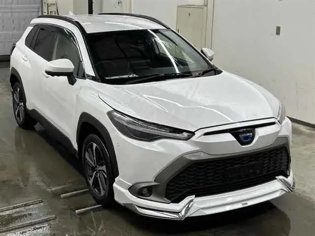 2025 Toyota Corolla Cross Hybrid Z - photo 1 2025 Toyota Corolla Cross Hybrid Z Pearl SUV for sale, Japanese used car export - photo 1 of 9 | GULJI TRADERS