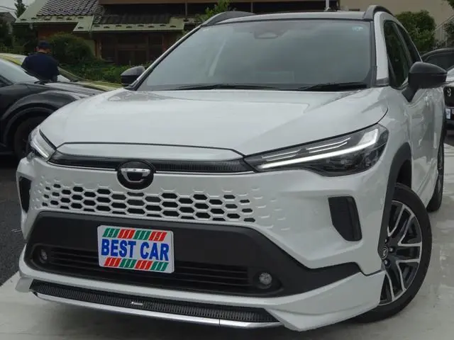 2026 Toyota Corolla Cross 1.8 Hybrid Z - photo 1 2026 Toyota Corolla Cross 1.8 Hybrid Z White SUV for sale, Japanese used car export - photo 1 of 48 | GULJI TRADERS