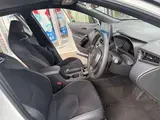 2026 Toyota Corolla Cross 2.0 GR Sport E-Four 4WD Pearl SUV for sale, Japanese used car export - photo 14 of 24 | GULJI TRADERS