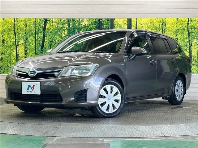 2013 Toyota Corolla Fielder Hybrid G - photo 1 2013 Toyota Corolla Fielder Hybrid G Other Van for sale, Japanese used car export - photo 1 of 30 | GULJI TRADERS