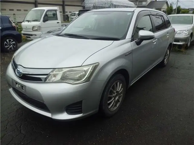 2013 Toyota Corolla Fielder hybrid - photo 1 2013 Toyota Corolla Fielder hybrid Silver Van for sale, Japanese used car export - photo 1 of 9 | GULJI TRADERS