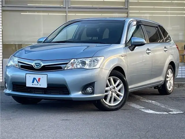 2013 Toyota Corolla Fielder Hybrid G - photo 1 2013 Toyota Corolla Fielder Hybrid G Blue Van for sale, Japanese used car export - photo 1 of 30 | GULJI TRADERS