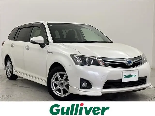 2013 Toyota Corolla Fielder HV G Aero Tourer W×B - photo 1 2013 Toyota Corolla Fielder HV G Aero Tourer W×B Pearl Van for sale, Japanese used car export - photo 1 of 23 | GULJI TRADERS