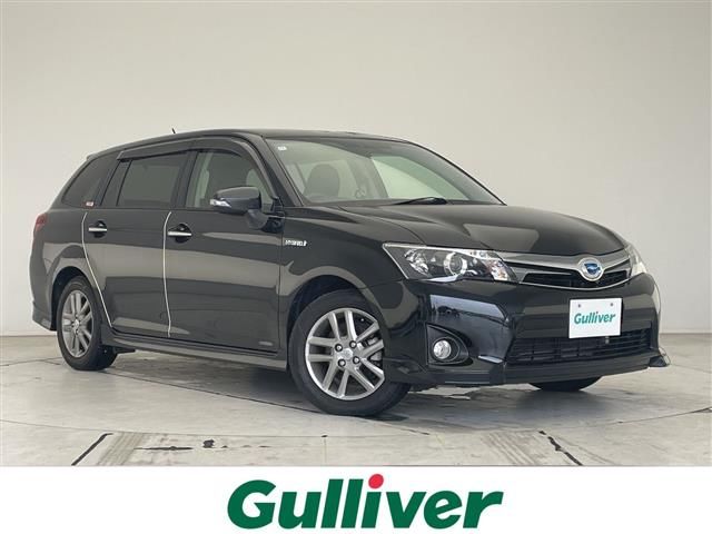2014 Toyota Corolla Fielder HV G Sedan for sale, Japanese used car export - photo 1 of 24 | GULJI TRADERS