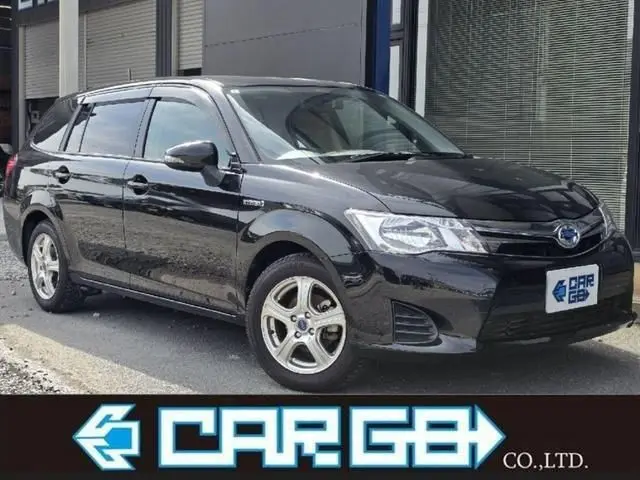 2014 Toyota Corolla Fielder hybrid - photo 1 2014 Toyota Corolla Fielder hybrid Black Van for sale, Japanese used car export - photo 1 of 9 | GULJI TRADERS