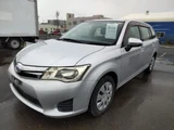2014 Toyota Corolla Fielder HYBRID 2WD ECVT Sedan for sale, Japanese used car export - photo 1 of 9 | GULJI TRADERS
