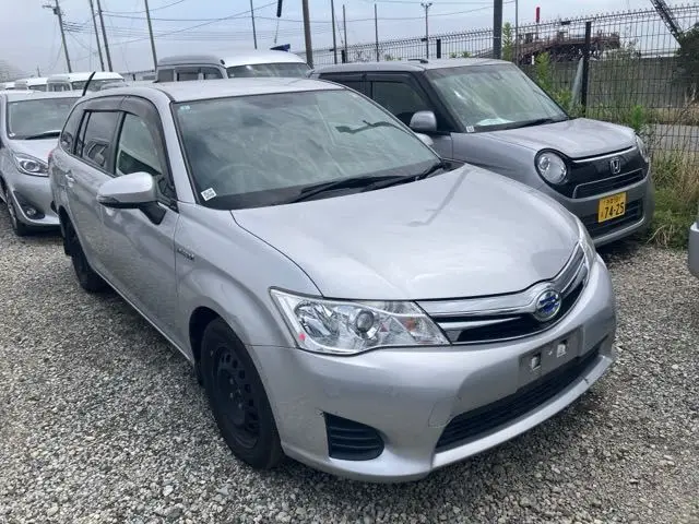 2015 Toyota Corolla Fielder - photo 1 2015 Toyota Corolla Fielder Silver Van for sale, Japanese used car export - photo 1 of 8 | GULJI TRADERS